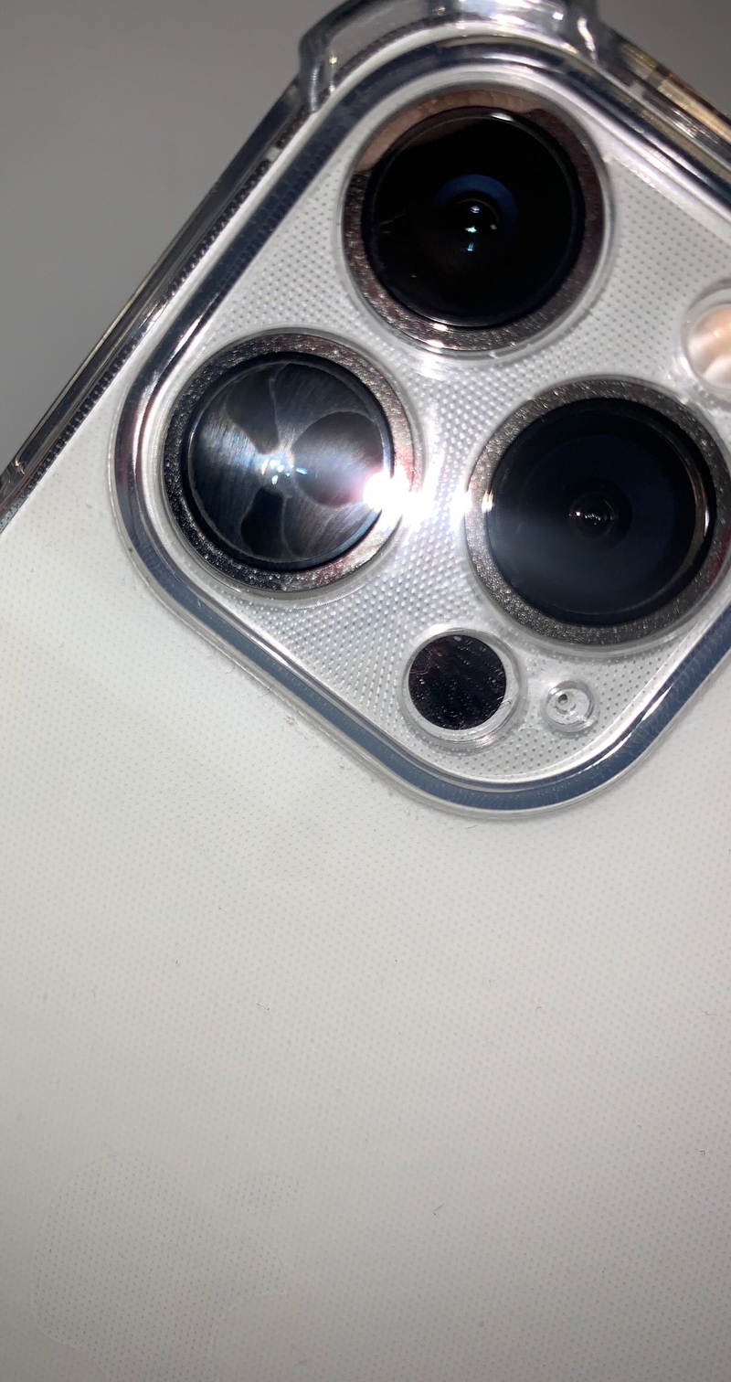 iPhone 13promax 镜头内部有像水渍一样的东西，售后说要 ...-1.jpg